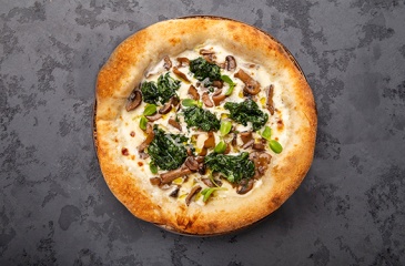 Піца з лісовими грибами та трюфельним маслом